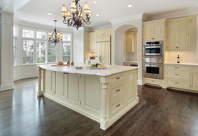 newly installed grey laminate flooring in modern kitchen in Genoa, NY